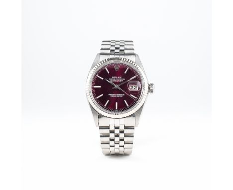A GENTLEMAN'S STEEL &amp; WHITE GOLD ROLEX OYSTER PERPETUAL DATEJUST BRACELET WATCH CIRCA 1977, REF. 1601 
D: Purple dial wit