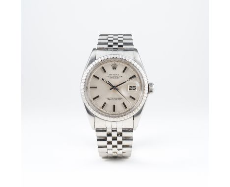 A GENTLEMAN'S STAINLESS STEEL ROLEX OYSTER PERPETUAL DATEJUST BRACELET WATCH CIRCA 1977, REF. 1603 
D: Silver dial with silve