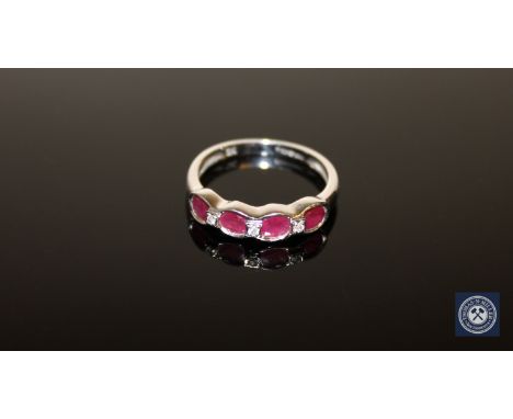 A ruby and diamond half-eternity ring, size N