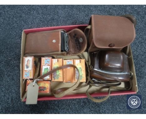 A tray of six boxed Matchbox locomotives and coaches, Kodak Brownie camera, etc 