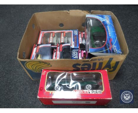 A box of boxed Corgi Collection James Bond vehicles and a Tonka Jaguar Mark II  