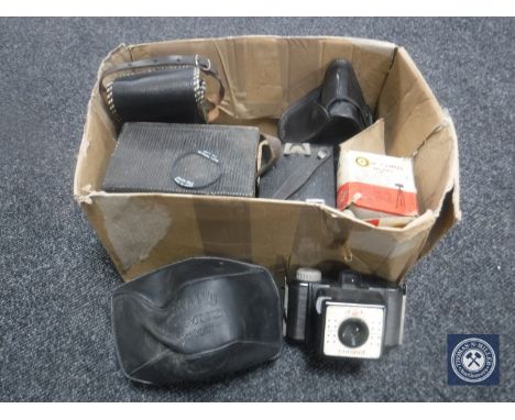 A box of assorted cameras including Kodak Brownie, Coronette, Pathoscope etc  