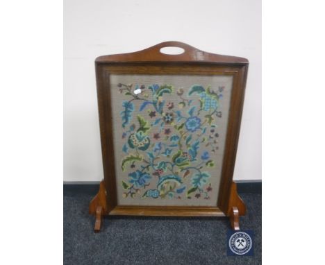 An oak tapestry fire screen 