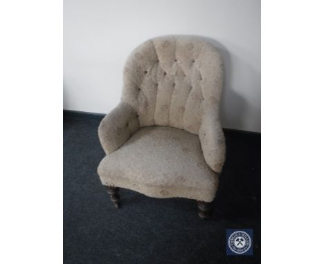 A Victorian button back lady's chair 