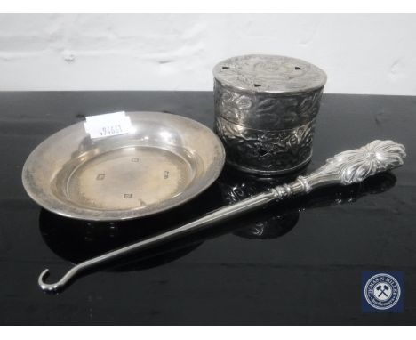 A silver shallow dish, silver-handled button hook and a continental lidded silver pot 