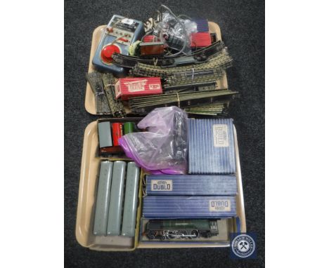 A collection of Hornby Dublo railway items to include Duchess of Montrose engine and tender, tank locomotive, carriages, roll