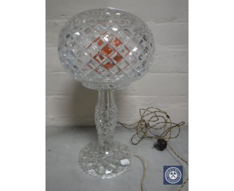 A cut glass table lamp with shade 