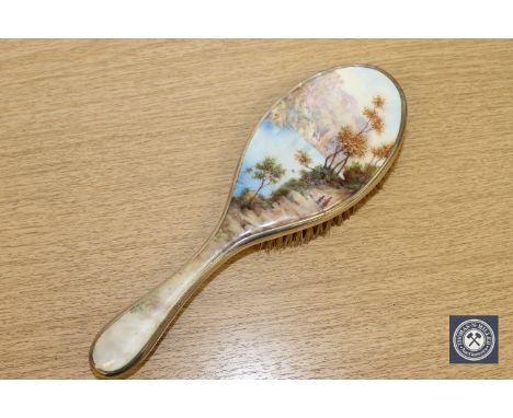 A fine quality silver and enamel dressing table brush depicting an Alpine scene