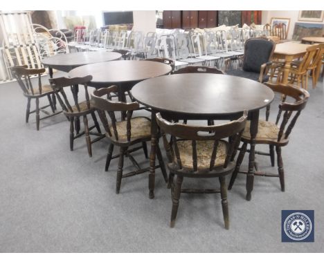 Three circular bar tables and eight tapestry upholstered elbow chairs 