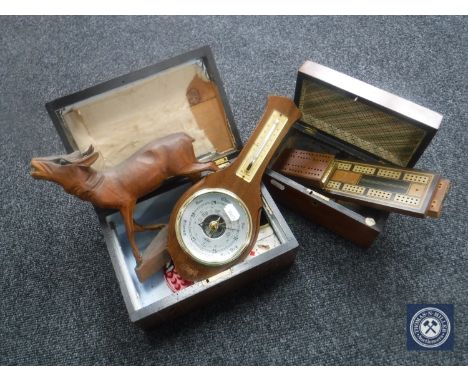 Two Victorian mahogany jewellery boxes containing cribbage boards, carved figure of a deer, barometer, playing cards 