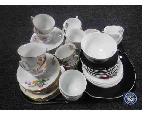 A nineteen-piece Queen Anne china tea service and two further part tea services 