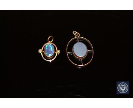 Two antique gold pendants, one set with agate, the other opal and seed pearls