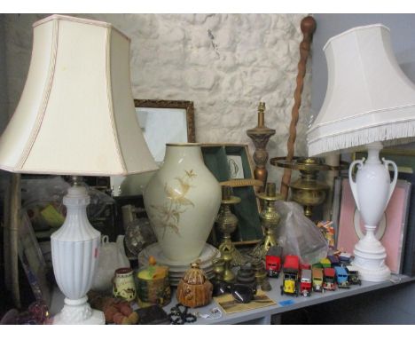 A miscellaneous lot to include a gilt mirror, table lamps, camera equipment, die cast vehicles, mixed ceramics, glass, brassw