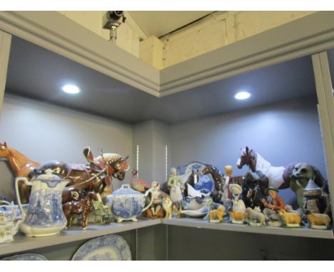 A mixed lot of ceramic and resin horses and other animal ornaments, along with a collection of miniature porcelain teapots 
