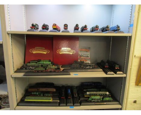 A collection of thirty Americon 00 gauge model locomotives with two folders of magazine information 