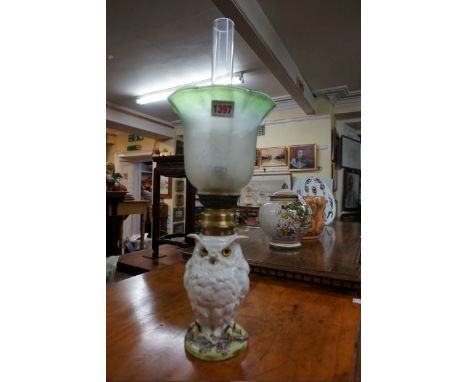 A French porcelain novelty owl oil lamp,&nbsp;height including shade 37cm, (restoration).&nbsp; 