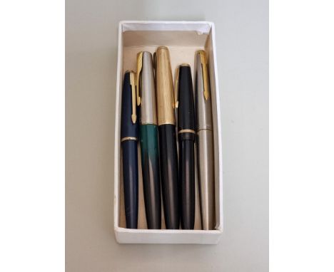A collection of pens,&nbsp;to include vintage Parker examples, some with gold nibs, and a Coca-Cola example. 