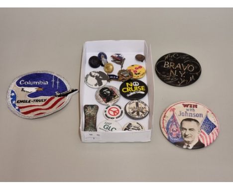 A small collection of vintage badges and buttons, to include CND and LBJ examples. 