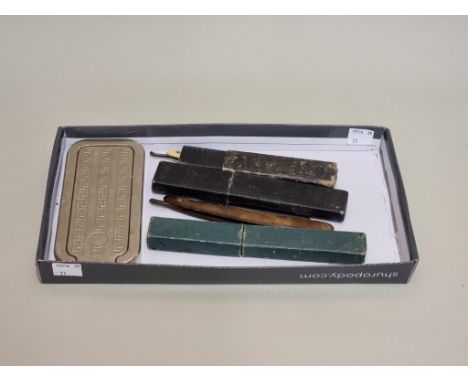 A mixed lot,&nbsp;to include a pocket telescope; brass sovereign scales; and an articulated painted wooden dog. 