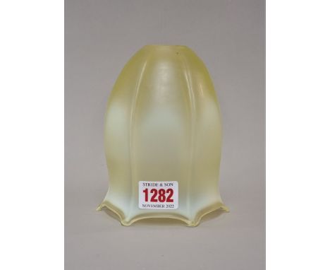 A Vaseline glass light shade, 14cm high. 