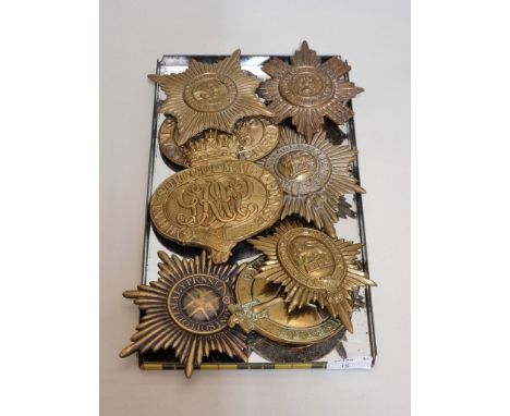 Eight British Army brass regimental valise pouch badges: to include Scots Guards; Grenadier Guards and Coldstream Guards exam