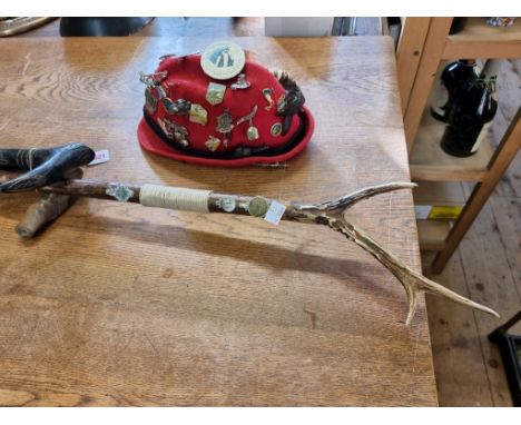 A carved wood novelty walking stick;&nbsp;together with an antique swordstick; a shepherd's crook; and a felt hat.&nbsp; 