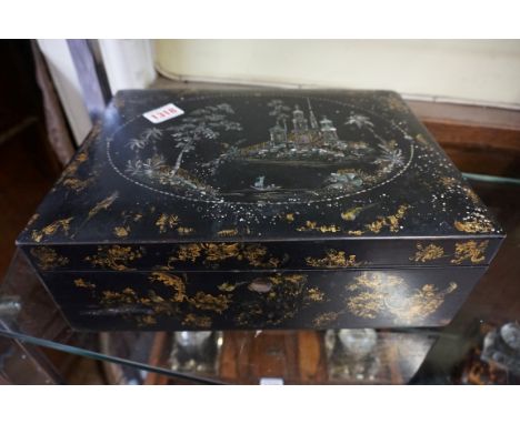 A 19th century papier-mache and mother of pearl casket,&nbsp;with gilt chinoiserie decoration, 30.5cm wide.&nbsp; 