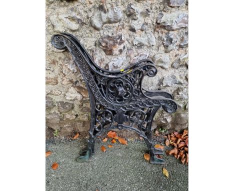 A pair of cast iron bench ends. 