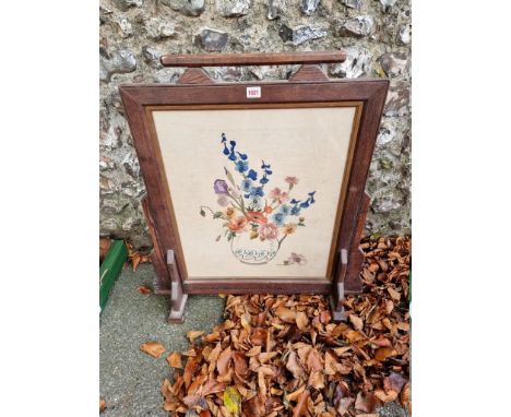 An Arts &amp; Crafts style oak tapestry fire screen, 60cm wide x 73cm high. 