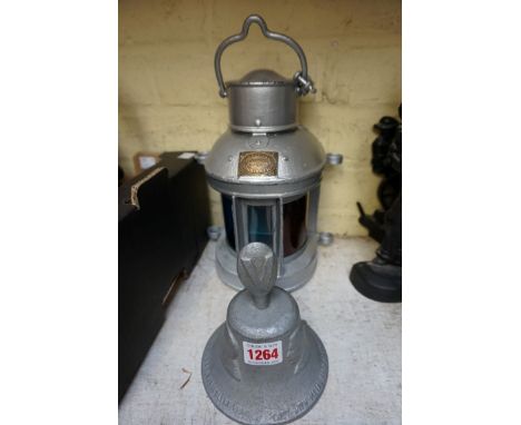 An aluminium 'RAF Benevolent Fund' bell,&nbsp;13.5cm high; together with a silver painted ship's lantern.&nbsp; 