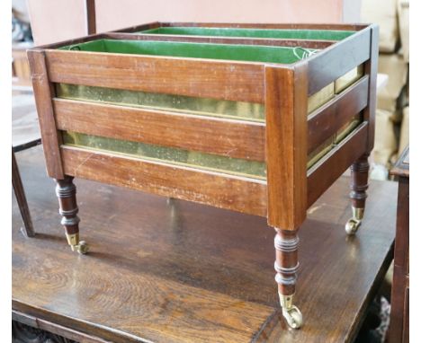 A 19th century mahogany two division planter with brass liners converted from a Canterbury, width 50cm, depth 38cm, height 42