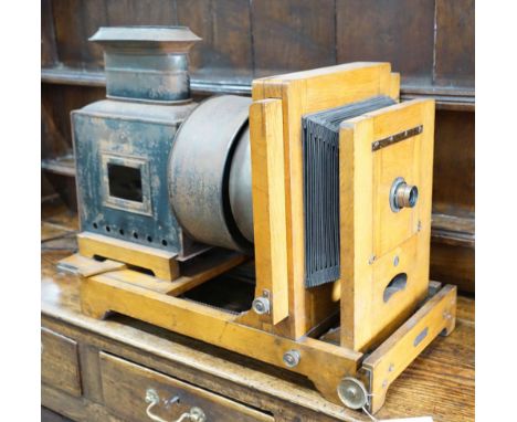 A Victorian oak magic lantern converted to electricity