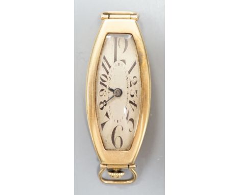 A stylish 1930's 14ct tonneau cased manual wind wrist watch, with tumbling Arabic numerals no strap, case diameter 18mm, gros