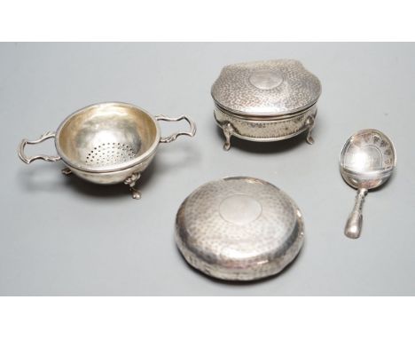 An Edwardian planished silver circular tobacco box, by George Unite, Birmingham, 1902, 79mm, a similar silver trinket box, a 