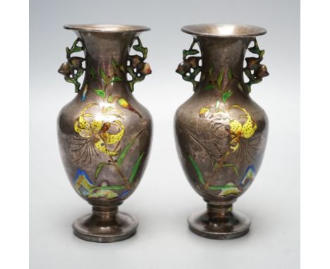 A pair of nice quality Chinese silver and enamel vases, late 19th century,15 cms high.