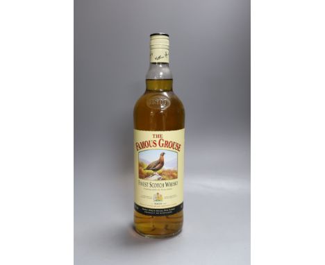 Thirteen single litre bottles of The Famous Grouse scotch whisky
