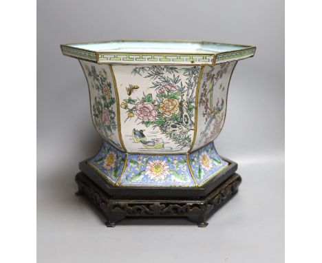 A Chinese Canton enamel jardiniere on hardwood stand, total height 23cm