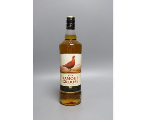 Eleven single litre bottles of The Famous Grouse scotch whisky