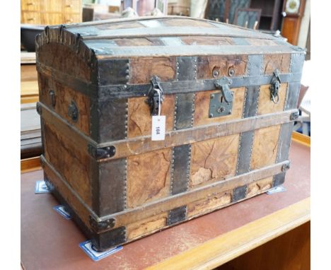 A late Victorian iron bound domed top trunk, length 82cm, depth 48cm, height 60cm