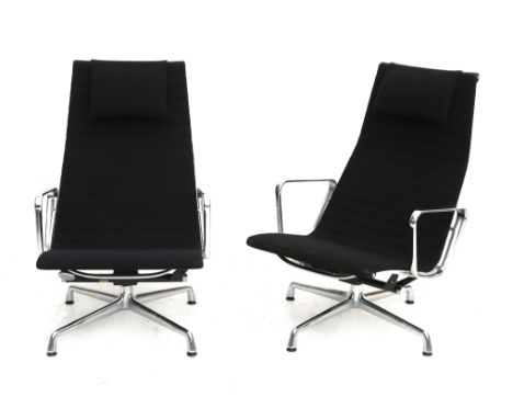 Charles &amp; Ray Eames Two Aluminium Group easy chairs with black Hopsak upholstery, model EA123, marked with label: Herman 