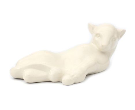 Plateelbakkerij Zuid Holland, Gouda A white glazed ceramic figure of a reclining cat, circa 1930-1931, marked with manuufactu