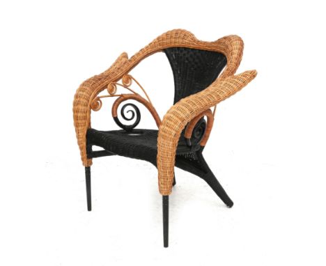 Borek Sipek (1949-2016) A rattan and cane wickered armchair, partly black lacquered, model Prorok, produced by Driade, Italy,