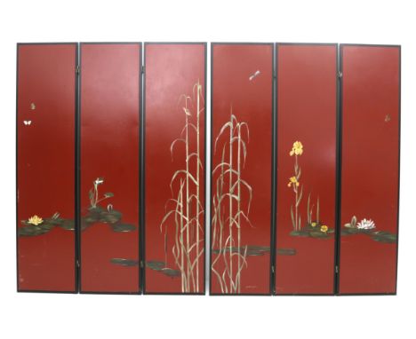 Petronelle Wijnekus (1945-2017) A pair of three-piece folding screens, each decorated to one side with water plants, one scre