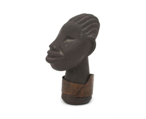 Jaap Ravelli (1916-2011) A small ceramic African female head with copper necklace, 1950s, signed underneath, small chip on he
