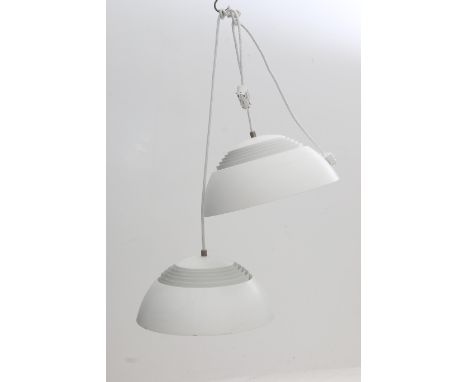 Arne Jacobsen (1902-1971) Two white lacquered metal and white lucite AJ Royal hanging lamps, model 19550, produced by Louis P