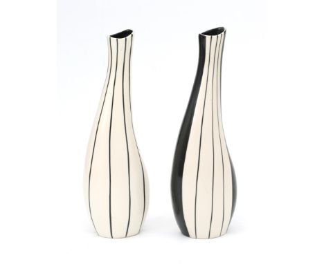 Wim Visser (1915-1977) Two ceramic vases, identical models, both with black linear patterns on a white ground, of which one w