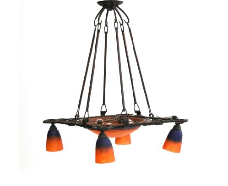 Charles Schneider (1881-1953) An Art Deco wrought iron hanging lamp with central orange and blue mottled glass shade and four