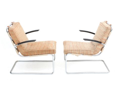 Willem Hendrik Gispen (1890-1981) A pair of chromium plated tubular steel armchairs with Gisolite armrests, model 411, produc