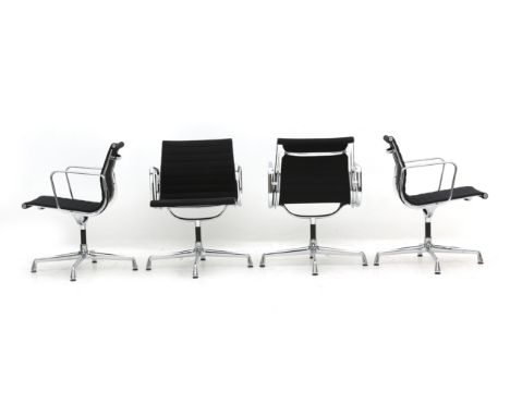 Charles &amp; Ray Eames Four Aluminium Group conference chairs with black Hopsak seats, model EA 104, produced by Vitra, mark