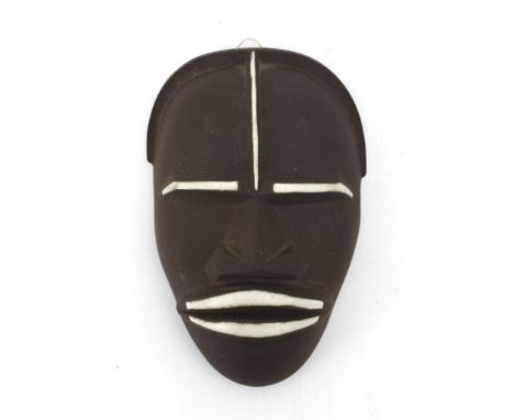 Jaap Ravelli (1916-2011) A ceramic African wall mask, 1950s, signed to the reverse. 12 x 8 x 4 cm. (hxwxd)
